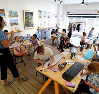 Design on a Skate Deck in an Art Gallery Workshop in Newcastle - Accommodation Batemans Bay
