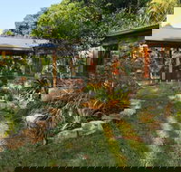 Palm Grove Rainforest Retreat - Accommodation Batemans Bay