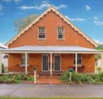 Eliza 1875 Red Brick Duplex Townhouse