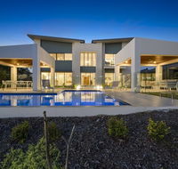 Luxury Canal Front Holiday House Raptor Pde Banksia Beach - Accommodation Batemans Bay