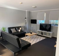 Cozy 3BR Townhouse in Liverpool CBD with parking - Accommodation Batemans Bay