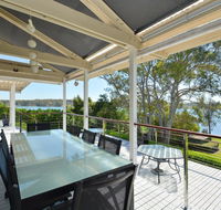 Morisset Bay Waterfront Views Lake House looking over Trinity Marina - Accommodation Batemans Bay