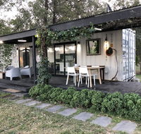 Absolute riverfront shipping container cabin - Accommodation Batemans Bay